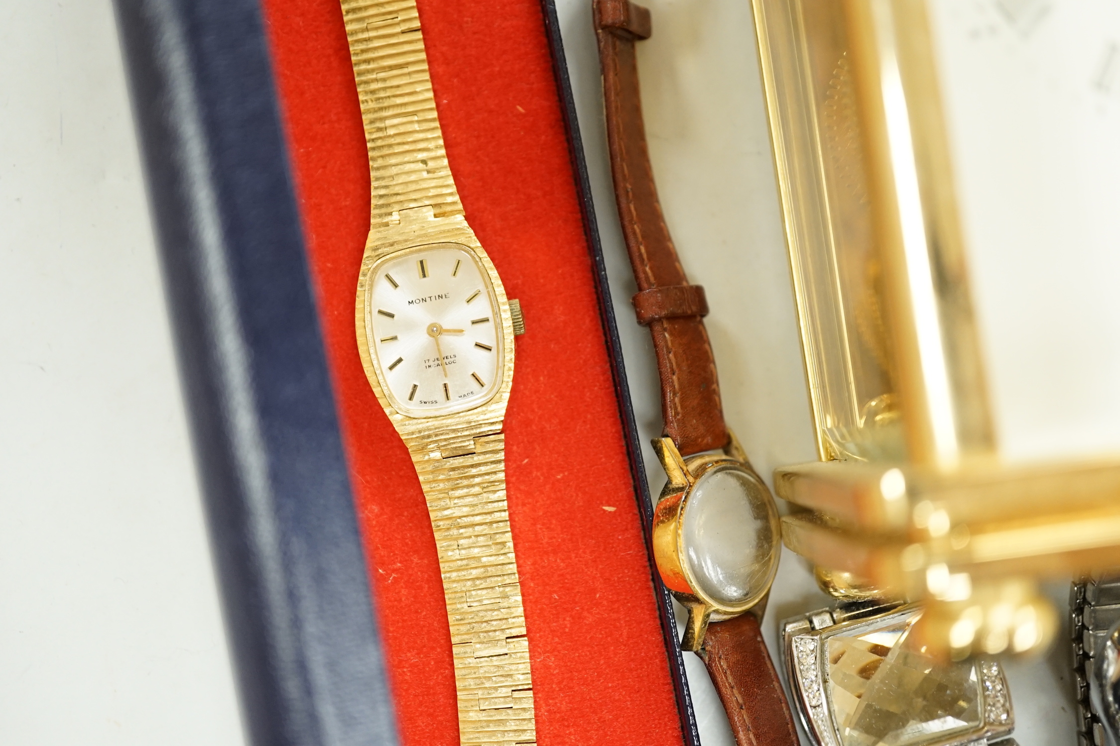 A modern brass cased carriage timepiece and a quantity of assorted lady's and gentleman's modern wrist watches.